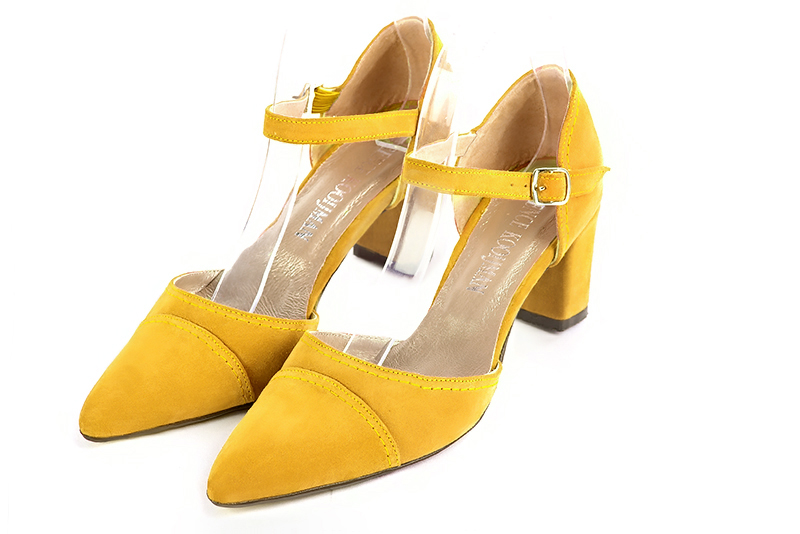Yellow women's open side shoes, with an instep strap. Tapered toe. Medium block heels. Front view - Florence KOOIJMAN